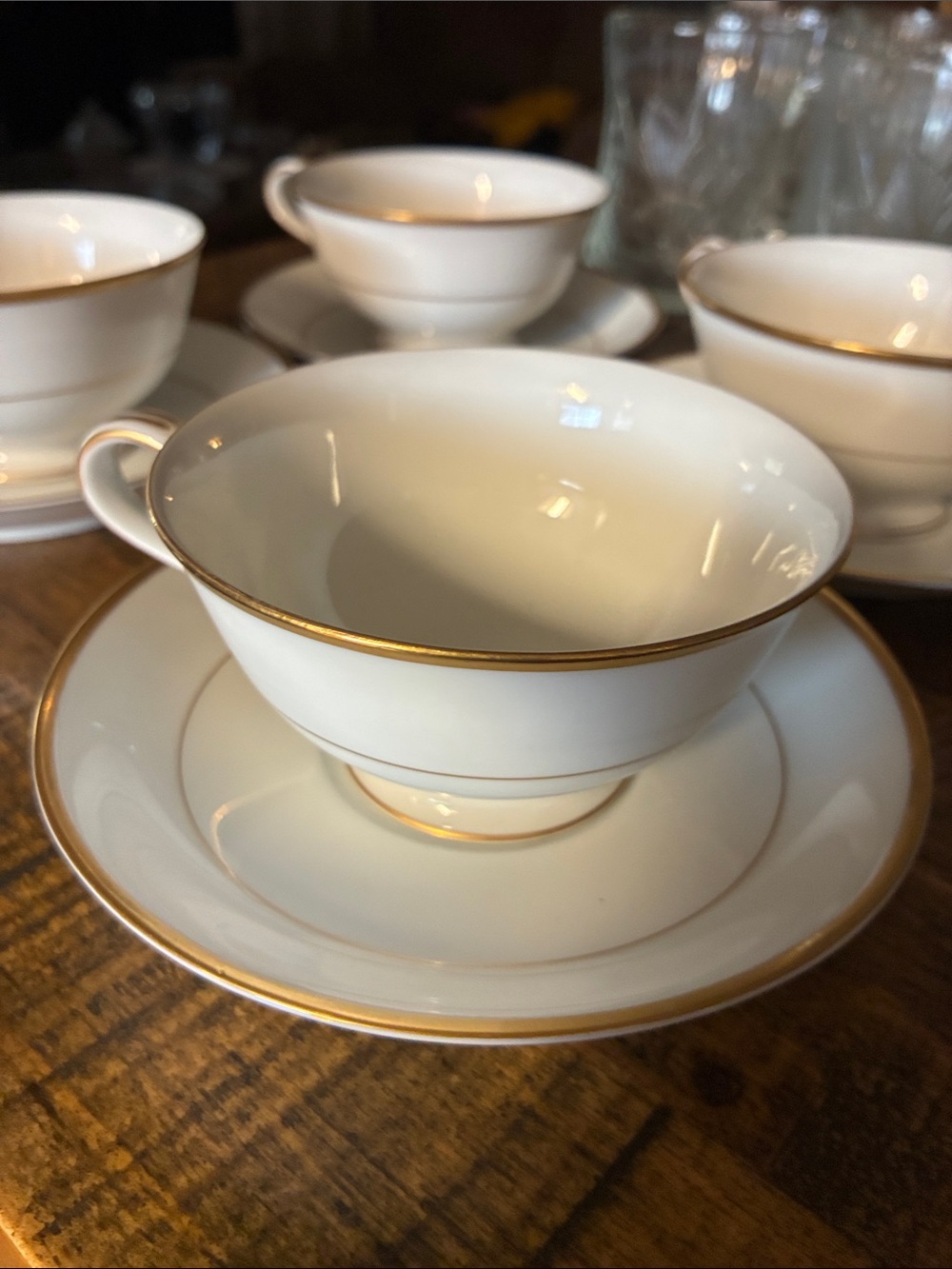 Noritake White Porcelain Teacup and Saucer Set with Gold Trim